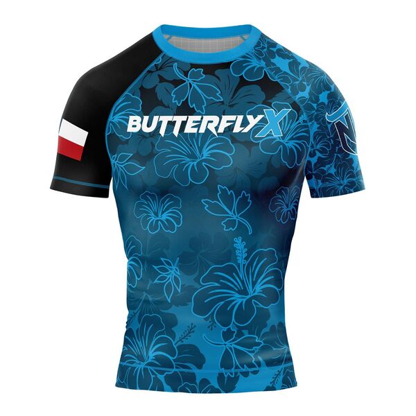 Blue hibiscus print rash guard with black sleeves, the ButterflyX logo and a flag on the sleeve