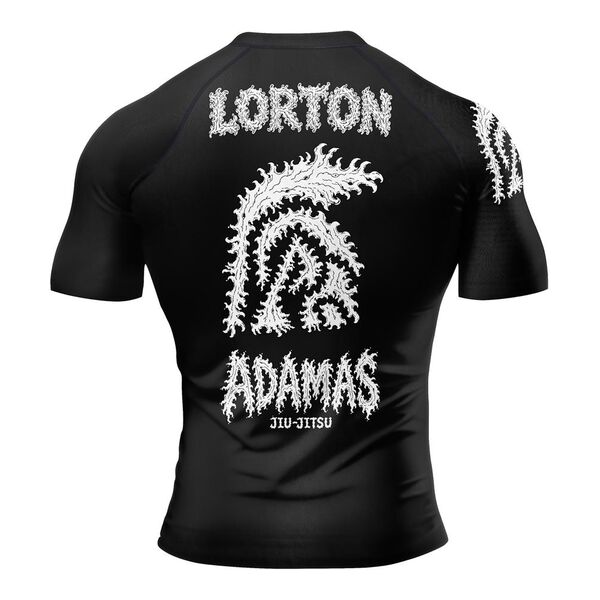 Back of a black rash guard reading Lorton and Adamas Jiu-Jitsu around a white crested helmet