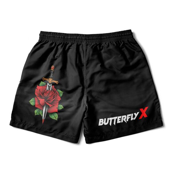 Black grappling shorts with a red rose pierced by a dagger and the ButterflyX logo